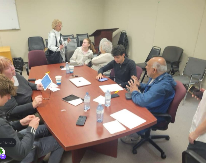 Community members participating in a technology workshop